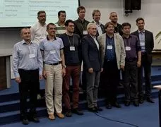 Prof. Dr. Martin Lames (Mitte) mit Teilnehmern des IACSS Symposiums in Moskau